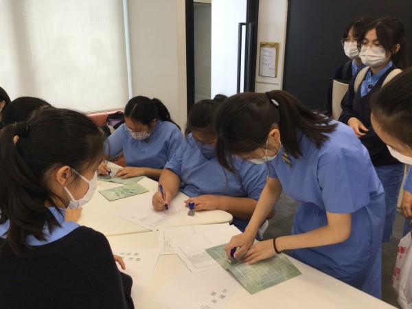 The English Society committee is dedicated to helping students with the stamp redemption for their English Activity Award scheme